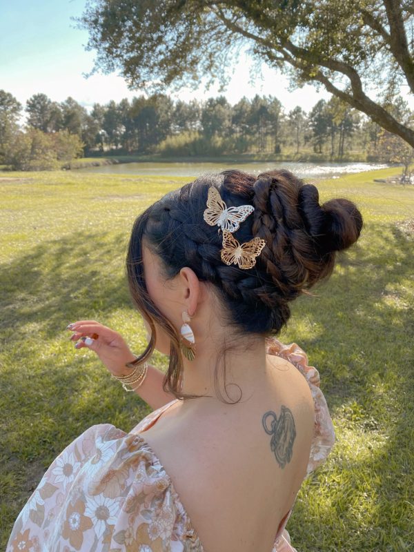 braided updo with butterfly clips